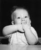 Baby holding palms in mouth  portrait Poster Print - Item # VARSAL2554520C
