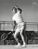 Low angle view of a young man playing tennis on a court Poster Print - Item # VARSAL2552605