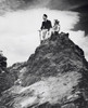 Young couple sitting on a mountain Poster Print - Item # VARSAL2554015