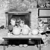 Girl and two boys preparing Jack O' Lantern for Halloween Poster Print - Item # VARSAL255418590