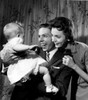 Happy parents with baby girl Poster Print - Item # VARSAL255416146