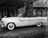 Two people standing near a 1955 Ford Poster Print - Item # VARSAL25528002