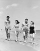 Two young couples walking on beach Poster Print - Item # VARSAL25521085