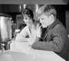 Woman looking at boy drinking milk shake Poster Print - Item # VARSAL255422667