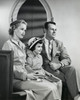 Parents and their daughter sitting in a church Poster Print - Item # VARSAL2553175