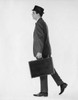 Young businessman carrying briefcase  side view Poster Print - Item # VARSAL25548178