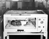 Baby sleeping in an incubator Poster Print - Item # VARSAL25533890