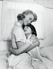 Side profile of a mother hugging her daughter Poster Print - Item # VARSAL25519794