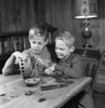 Two boys repairing machine Poster Print - Item # VARSAL255418096
