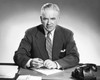 Businessman sitting in an office and smiling Poster Print - Item # VARSAL25515682