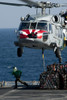 An MH-60S Sea Hawk picks up pallets from the flight deck of of USNS Rainier Poster Print - Item # VARPSTSTK105297M