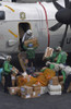 Arabian Gulf, February 11, 2012 - Sailors aboard the Nimitz-class aircraft carrier USS Abraham Lincoln load mail on to a C-2A Greyhound Poster Print - Item # VARPSTSTK105280M