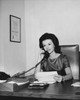 Businesswoman talking on the telephone in an office Poster Print - Item # VARSAL25512451