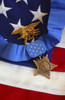 The Medal of Honor rests on a flag beside a SEAL trident during preparations for an award ceremony Poster Print - Item # VARPSTSTK107056M