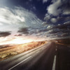 Asphalt road in field against moody clouds at sunset, Tuscany, Italy Poster Print - Item # VARPSTEVK200218S