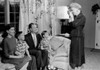 Grandmother taking photo of parents and kids on sofa Poster Print - Item # VARSAL255422273