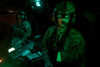Pilots equipped with night vision goggles in the cockpit of a UH-60 Black Hawk helicopter at Davis Monthan Air Force Base, Arizona Poster Print - Item # VARPSTTMO100902M