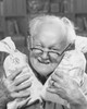 Portrait of a senior man holding two bags of money Poster Print - Item # VARSAL2551113