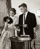 Young couple holding records near turntable Poster Print - Item # VARSAL2555826