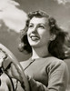 Low angle view of a young woman driving Poster Print - Item # VARSAL2552844