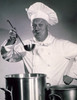 Portrait of a chef tasting food Poster Print - Item # VARSAL25518677