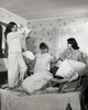 Four teenage girls having a pillow fight Poster Print - Item # VARSAL25511104