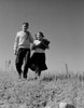 Teenage couple walking from school Poster Print - Item # VARSAL255422119