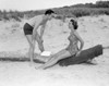 Young couple on beach Poster Print - Item # VARSAL255416333