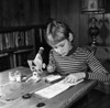 Boy doing homework Poster Print - Item # VARSAL255418102