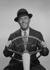 Portrait of mid adult man holding steering wheel Poster Print - Item # VARSAL255419095