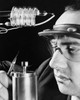 Close-up of a scientist with a laser equipment  Hughes Aircraft  Culver City  California  USA Poster Print - Item # VARSAL25535135