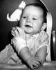 Baby girl sitting in high chair Poster Print - Item # VARSAL2559697