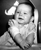 Baby girl sitting in high chair Poster Print - Item # VARSAL2559697