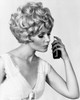 Close-up of a young woman smelling perfume Poster Print - Item # VARSAL25542541
