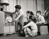 Mother with her three children watching television Poster Print - Item # VARSAL2551612