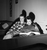 Young couple watching television Poster Print - Item # VARSAL255418050