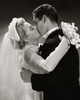 Side profile of a newlywed couple kissing Poster Print - Item # VARSAL255749