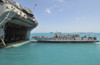 A landing craft utility approaches the well deck of USS Essex Poster Print - Item # VARPSTSTK104311M