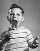 Close-up of a boy eating an ice cream Poster Print - Item # VARSAL2555482