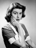 Studio portrait of young woman with hand on chin Poster Print - Item # VARSAL255424107