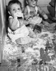 Two babies sitting on the floor covered in flour Poster Print - Item # VARSAL255657