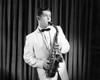 Mid adult man playing a saxophone on stage Poster Print - Item # VARSAL2556472
