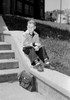 Boy sitting and looking away Poster Print - Item # VARSAL255416988
