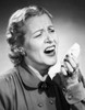 Close-up of a mid adult woman sneezing Poster Print - Item # VARSAL2553724