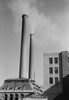 Factory with smoking chimneys  low angle view Poster Print - Item # VARSAL255418476