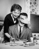 Mid adult woman covering eyes of mid adult man Poster Print - Item # VARSAL25525174