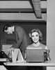 Young woman typing a document on a typewriter in an office Poster Print - Item # VARSAL25548805