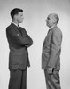 Side profile of two businessmen talking Poster Print - Item # VARSAL25548012