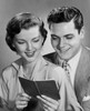 Close-up of a young couple holding a bank book Poster Print - Item # VARSAL2552994
