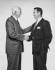 Two businessmen shaking hands Poster Print - Item # VARSAL25548056
